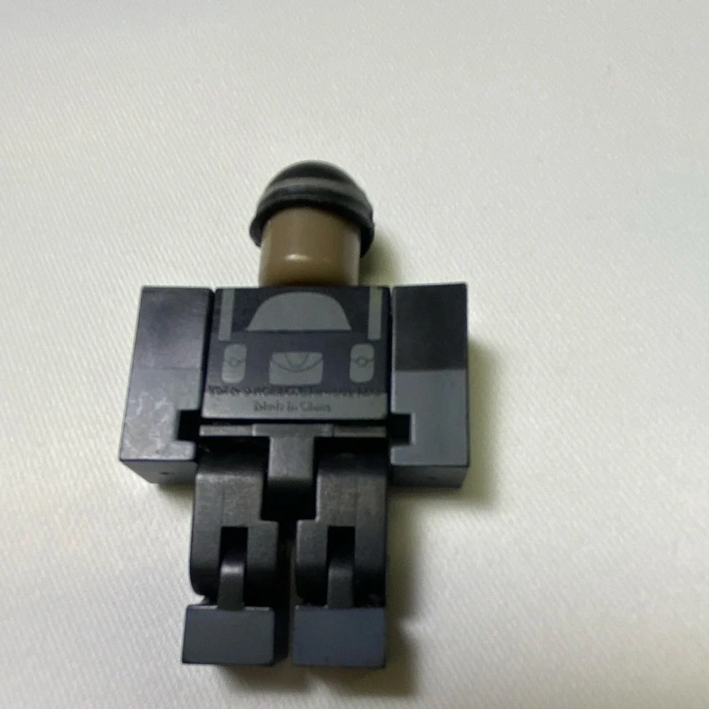 LEGO Minifigure Dark Gray Figure with Helmet mild scratches around body and face